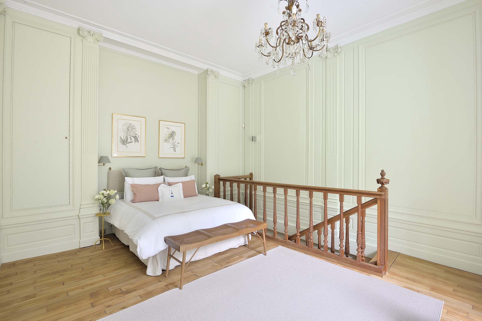 Stairs lead up to spacious bedroom.