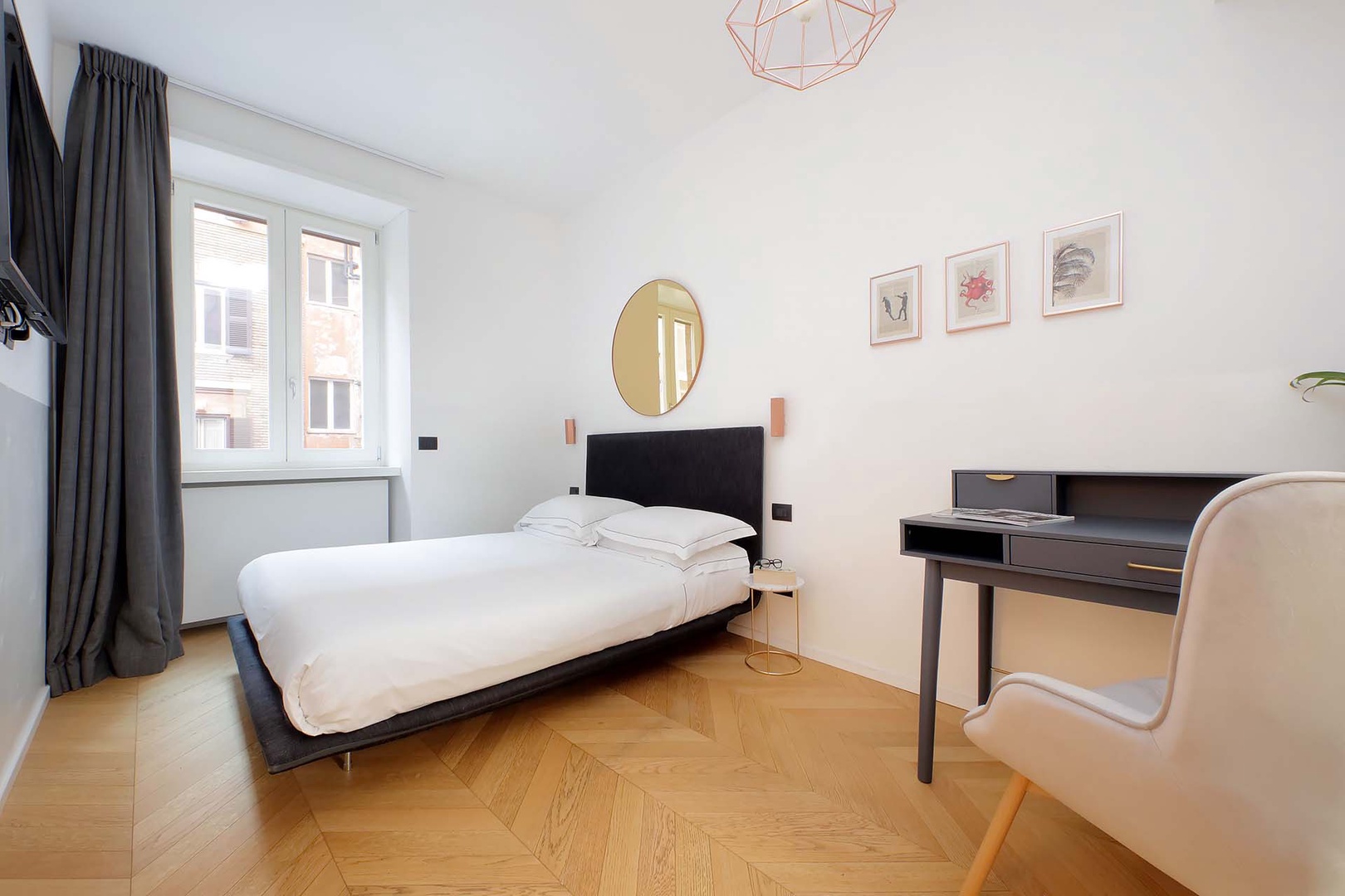 Bedroom 2 is large and full of light.