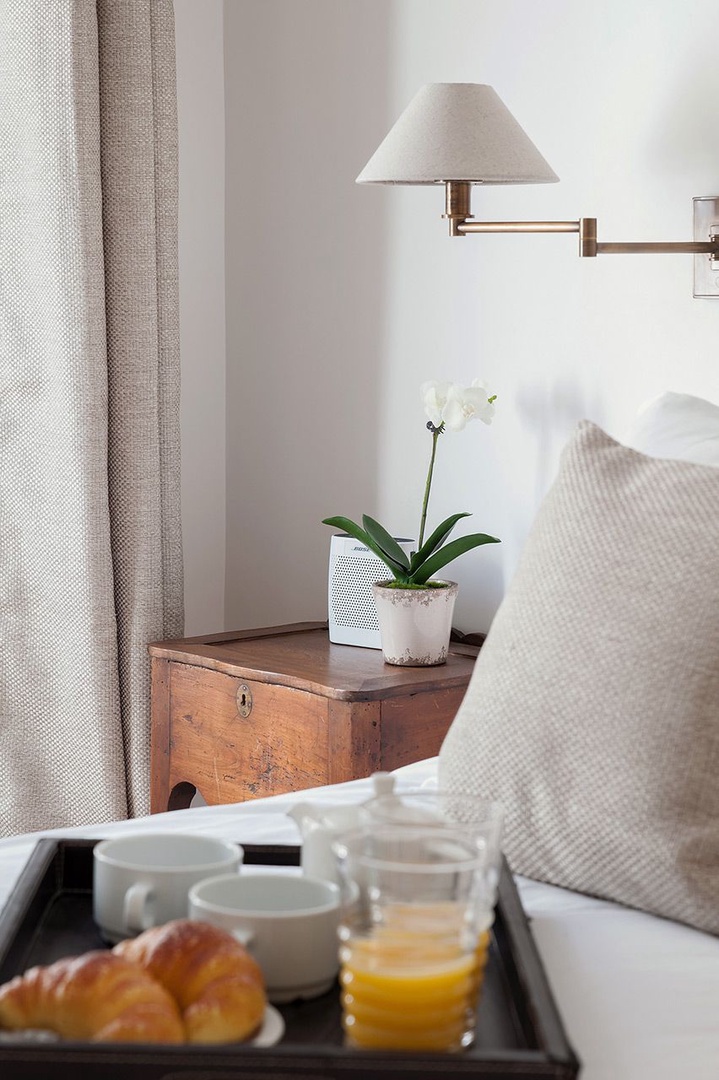 Side lamps create a great setting for late-night reading.