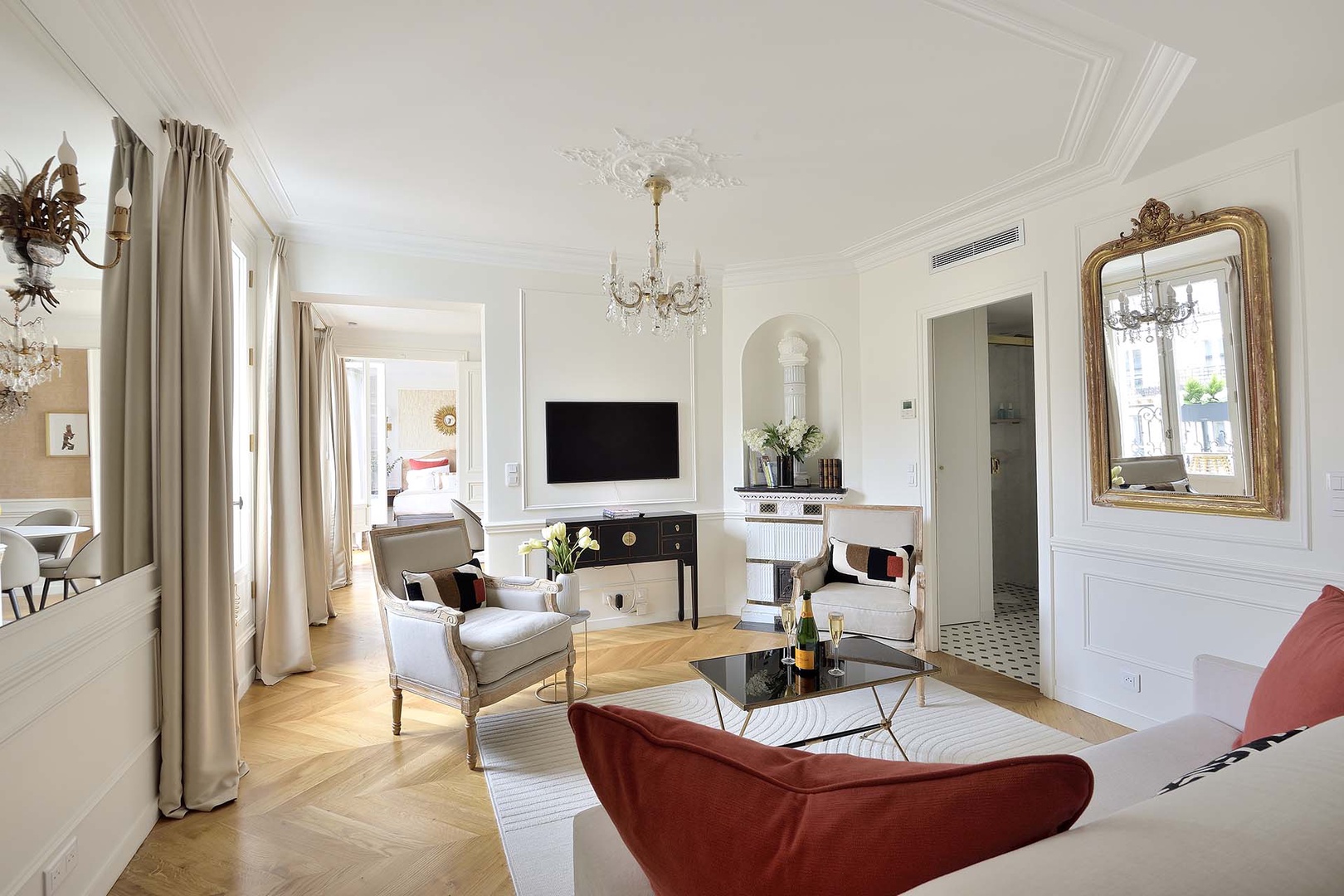 Living room leads to dining room and beyond to bedroom 1.