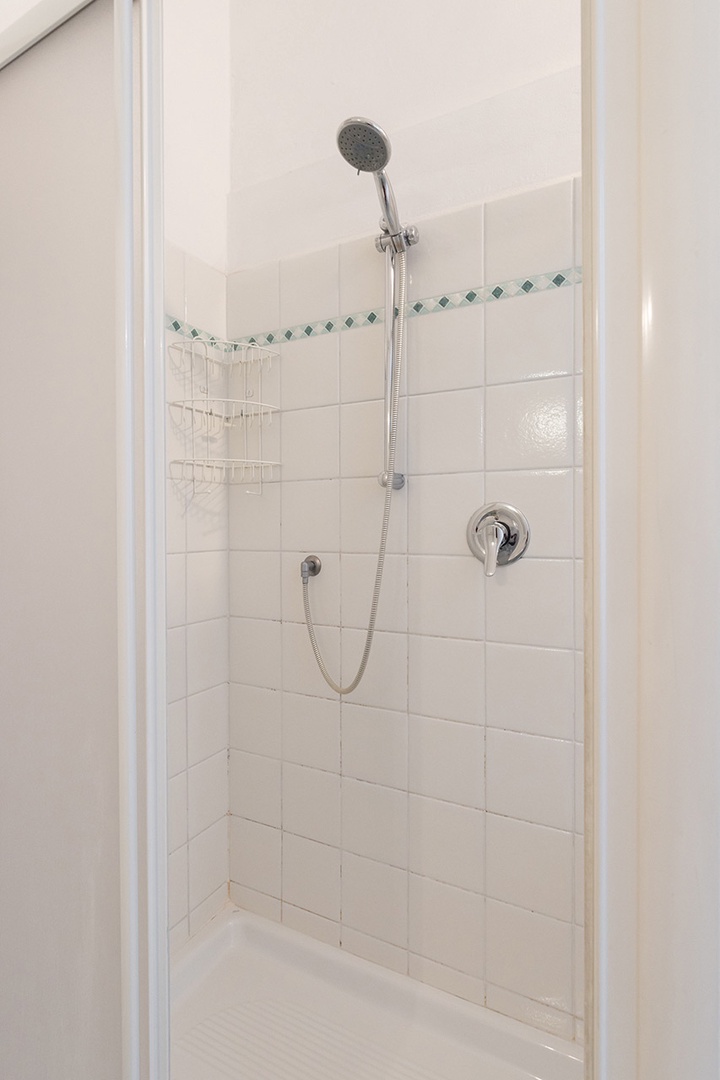 Good-sized shower in bathroom.