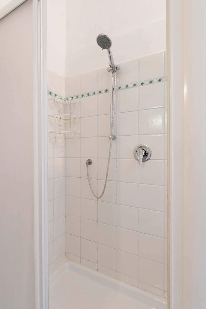 Good-sized shower in bathroom.