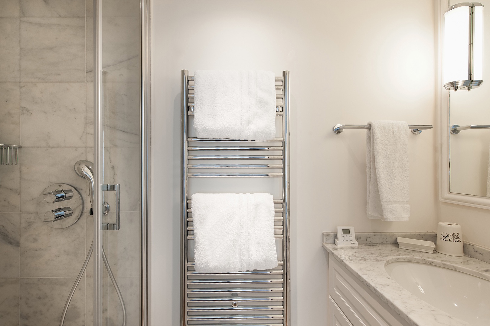 The heated towel rack lets you stay warm after your shower.