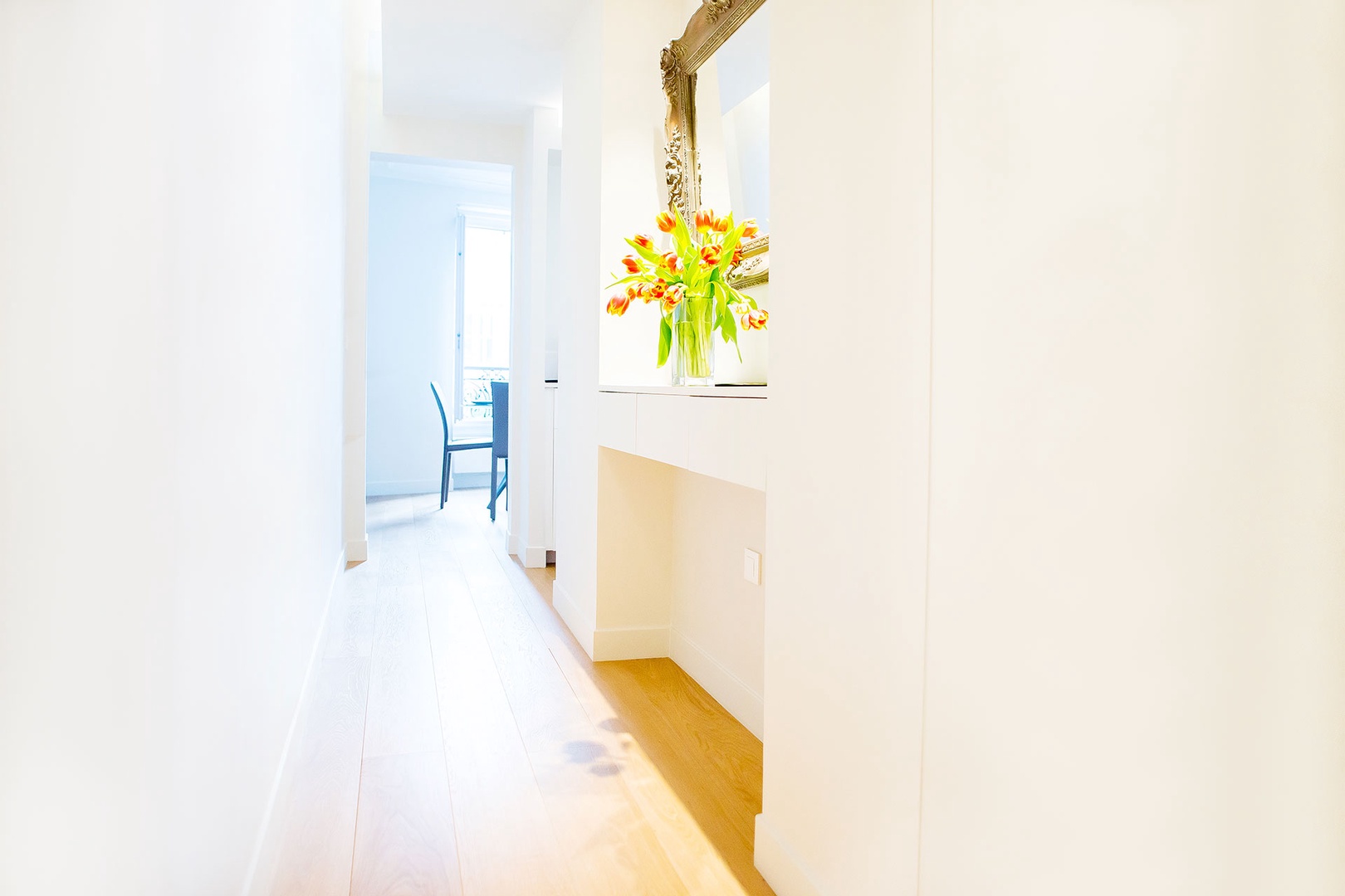 Entry hallway with dramatic lighting