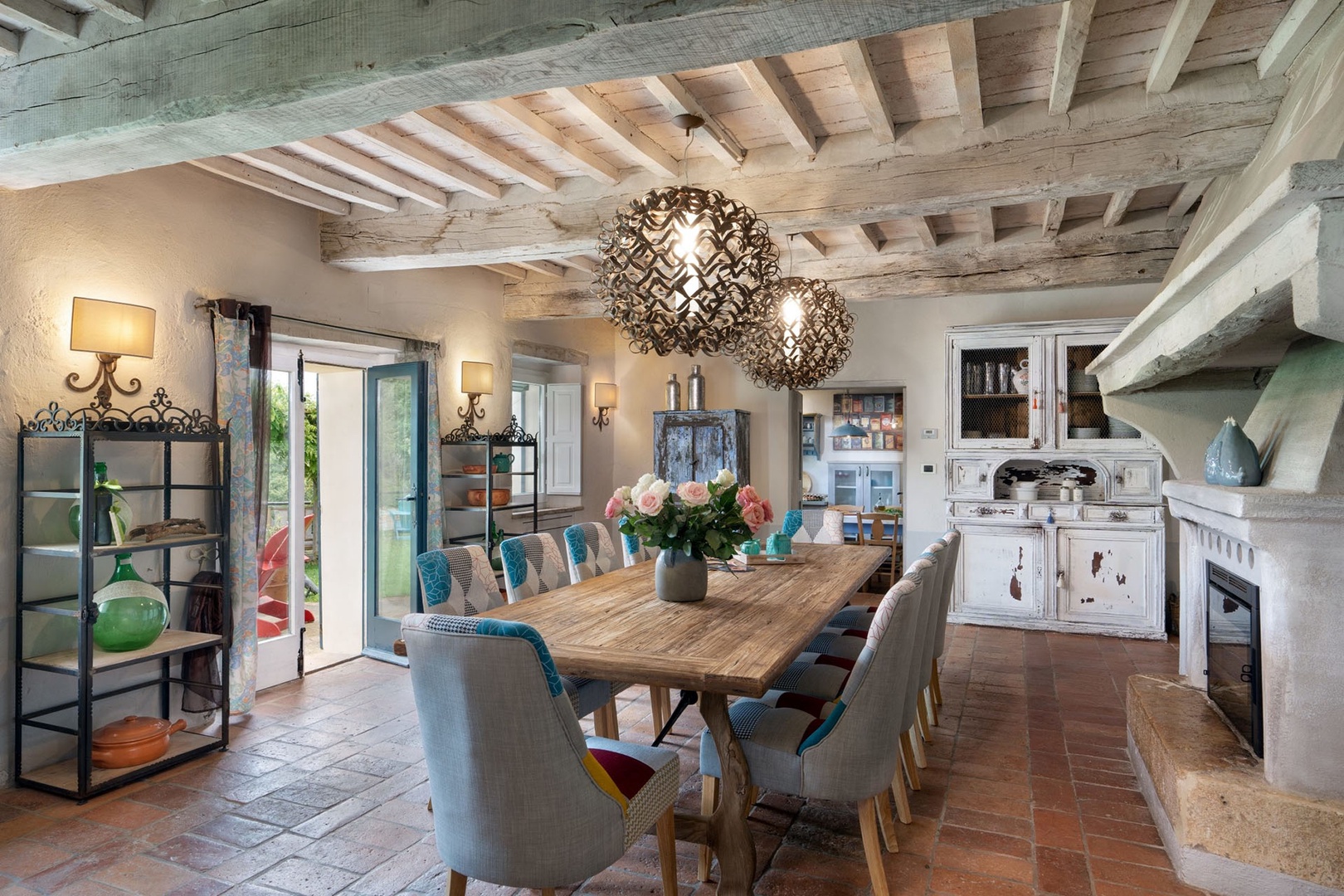 Dining area seats 12 and opens to the garden and pool terrace