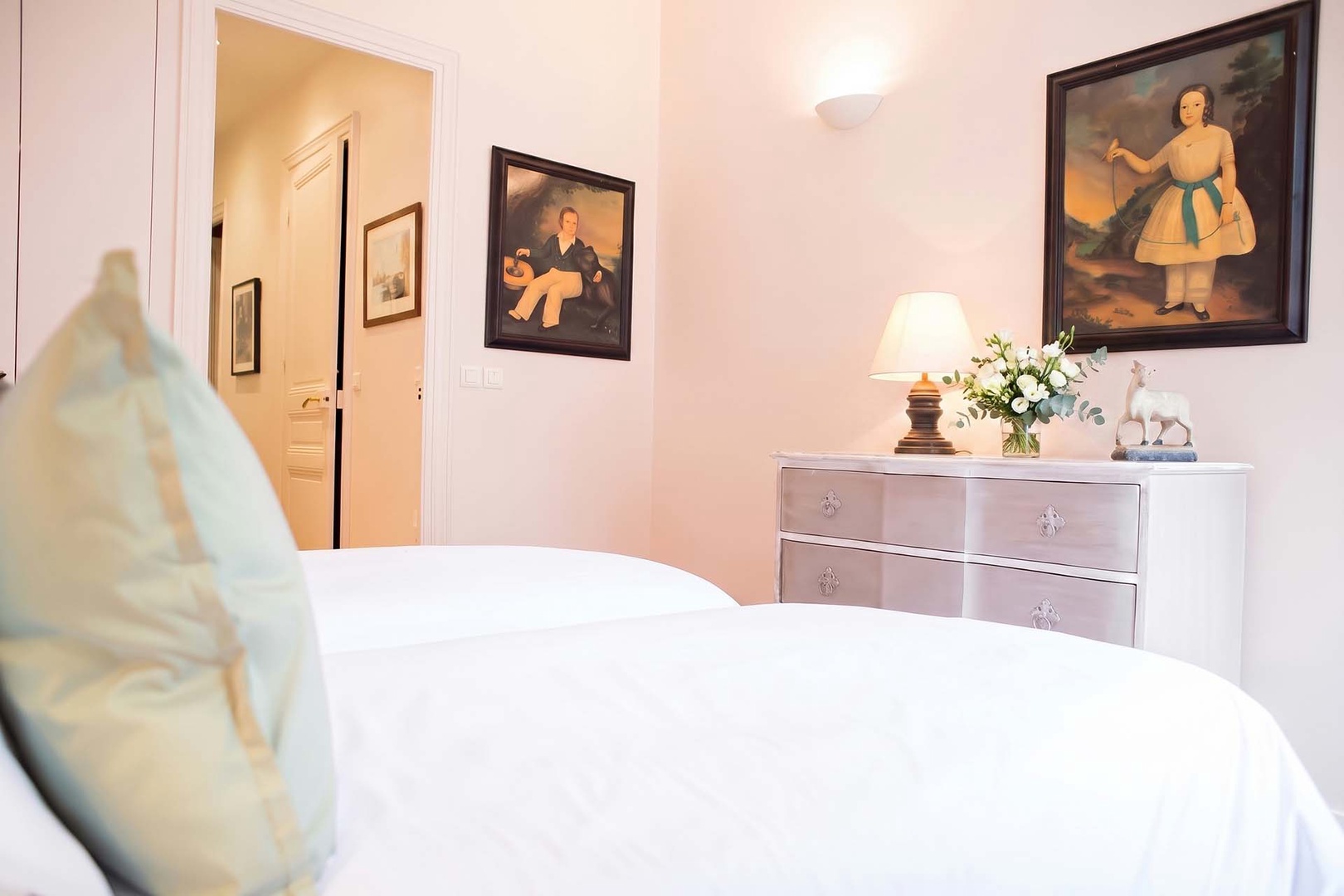 Bedroom 2 comes with two comfortable beds.