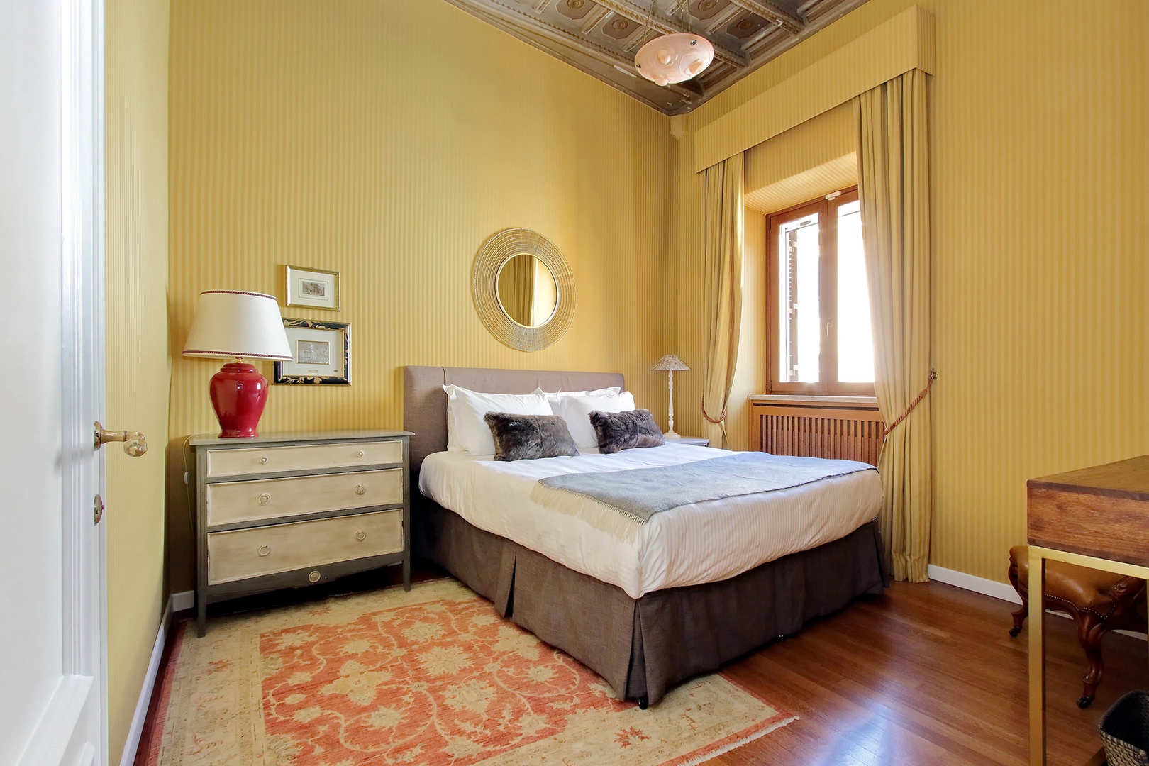 Beautiful bedroom 1 also overlooks the piazza.