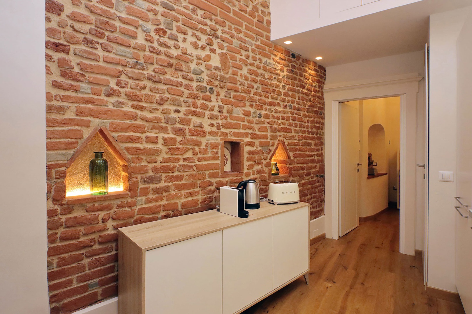 Exposed brick and inlets add to the charm of the Pierino