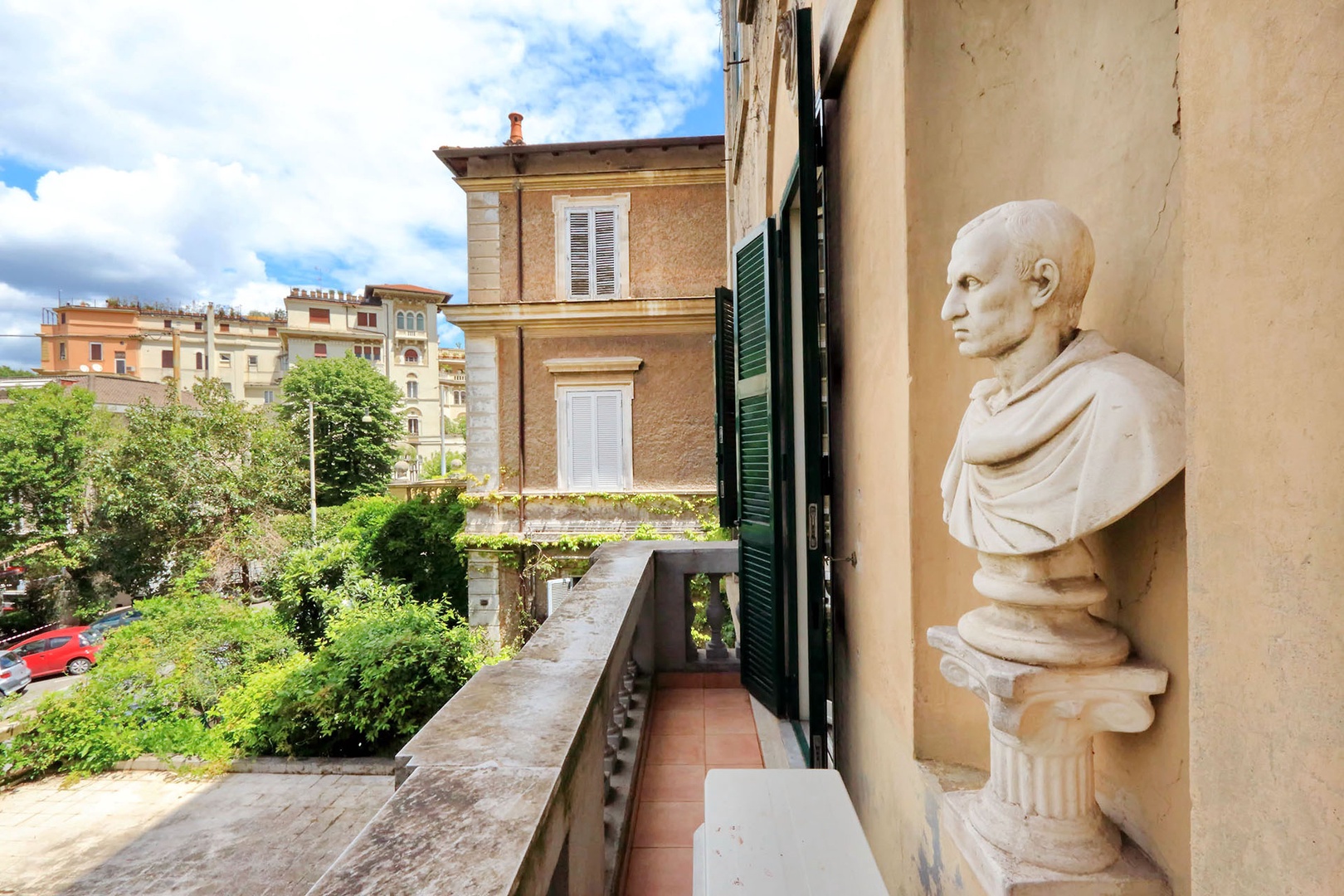 Balcony off the bedroom adds to the feeling of openness, light and air. Great neighborhood views.