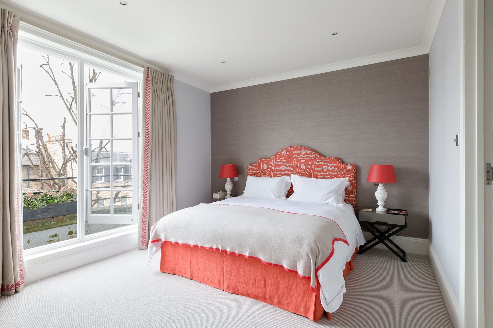 Beautiful step out balcony, natural light and cozy touches in the first bedroom