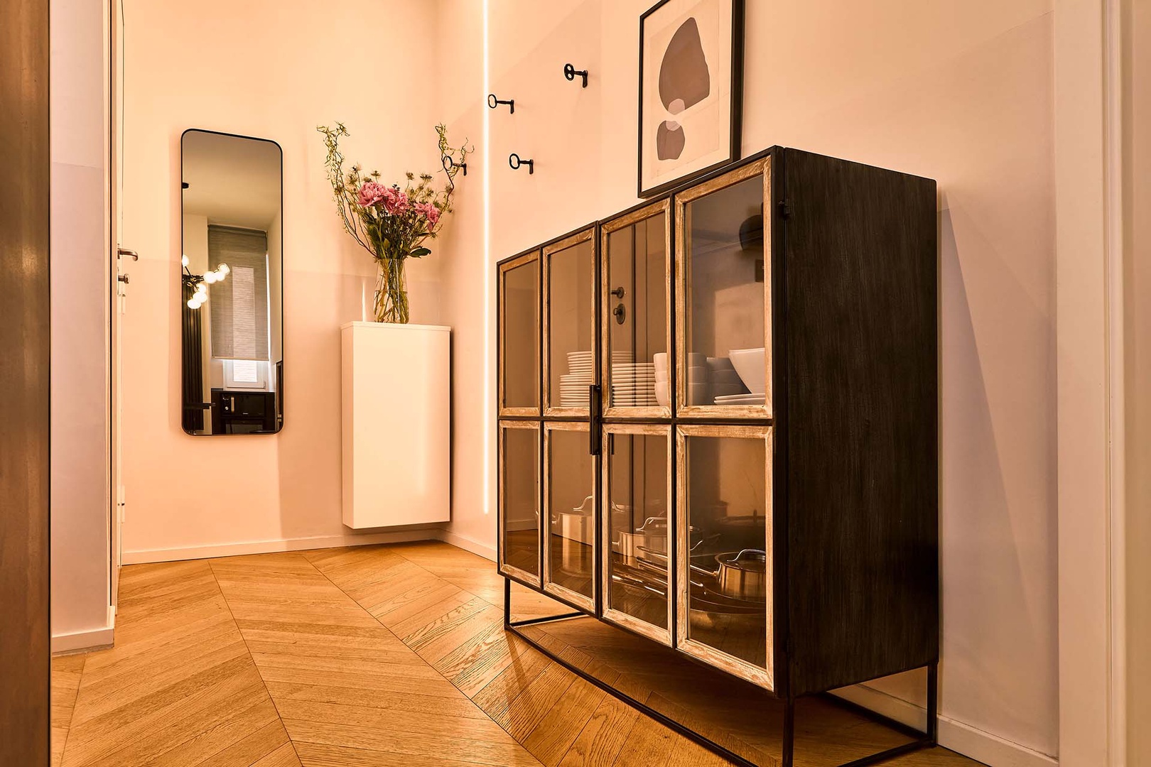 French barbed oak floors throughout are a rarity in Roman apartments.