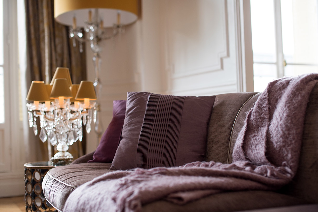 The comfy couch is perfect for relaxing after a long day exploring Paris.