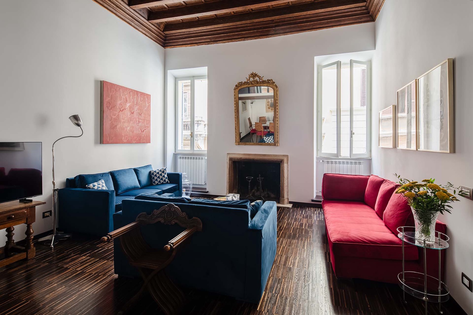 Large windows and soaring ceiling in the living room.