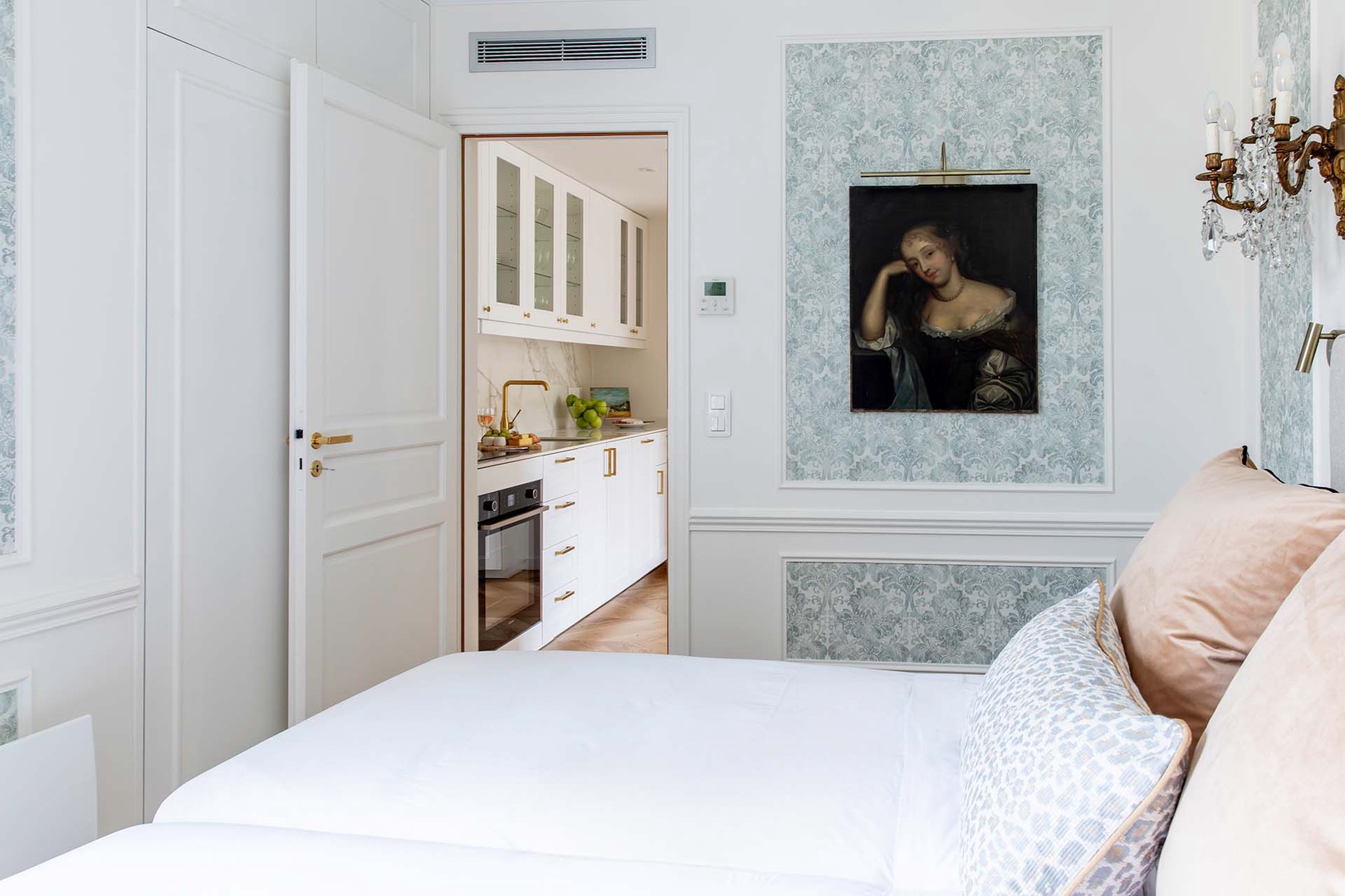 Bathroom 2 is located just opposite the kitchen from bedroom 2.