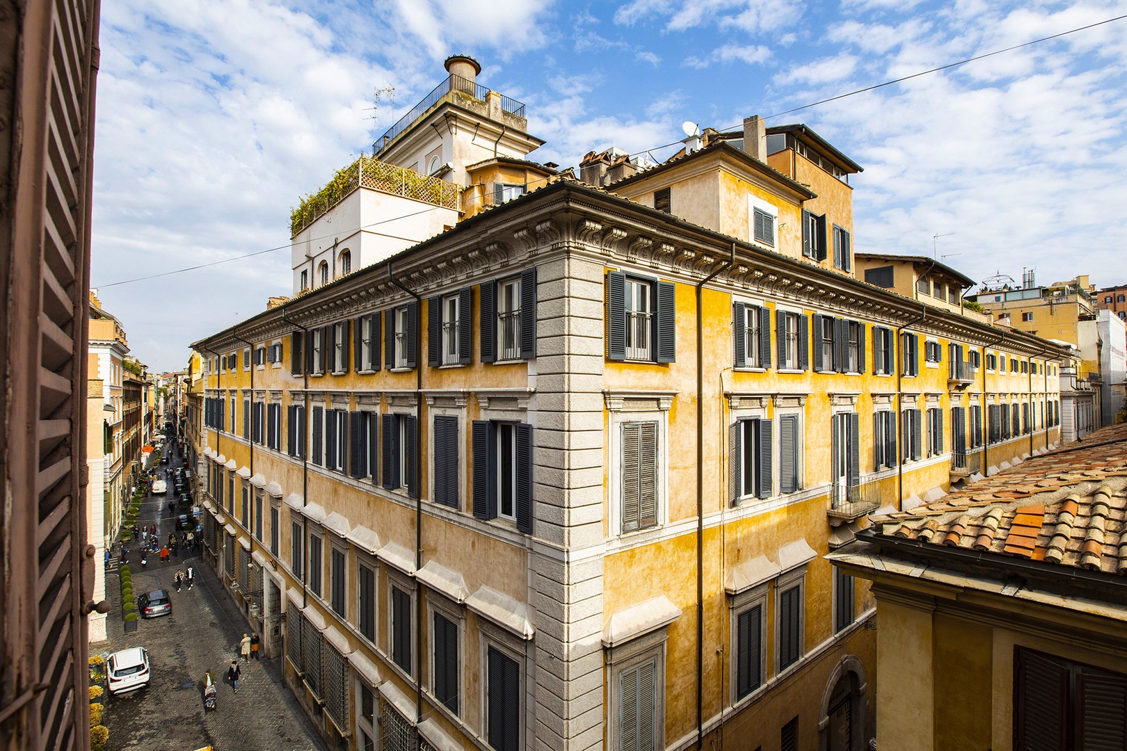 Enjoy classic Roman views of elegant palazzi from the living room.