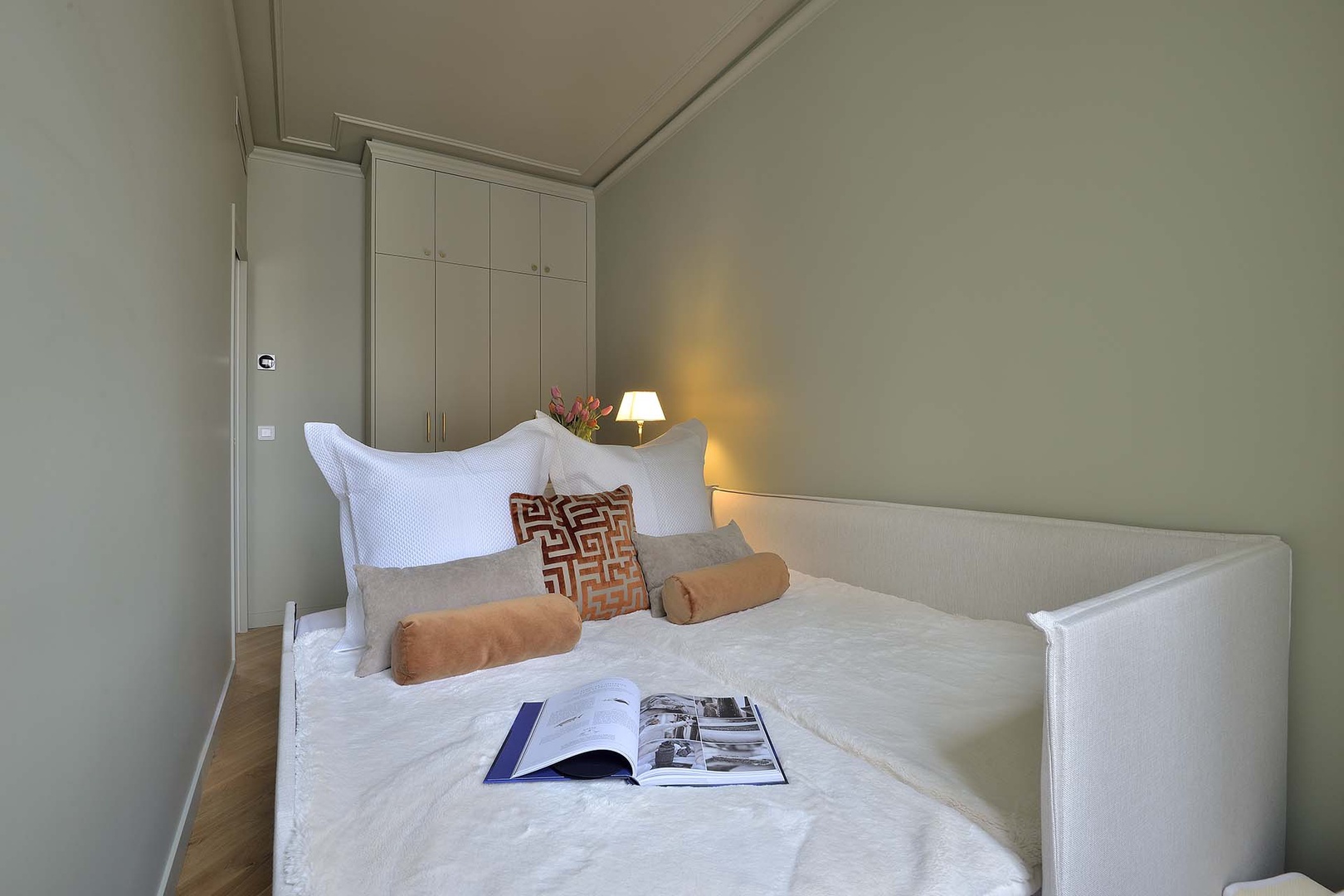 Sofa in bedroom 2 opens to create a comfortable sleeping space.