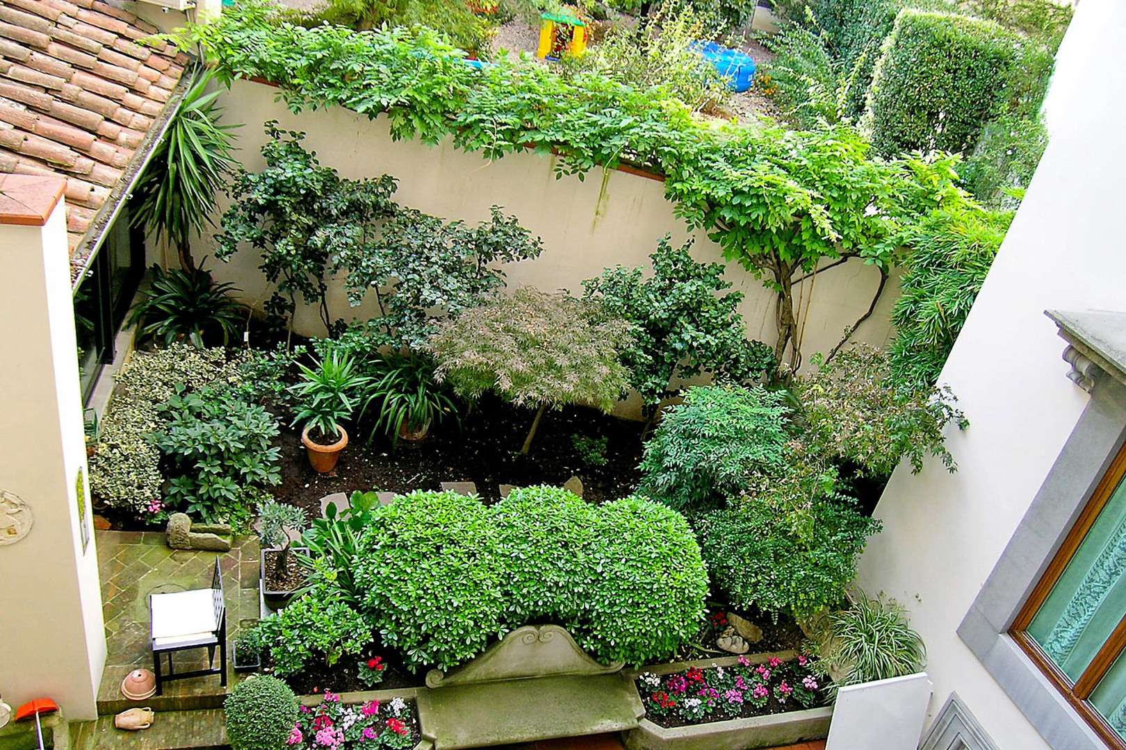 Pleasant garden below terrace.