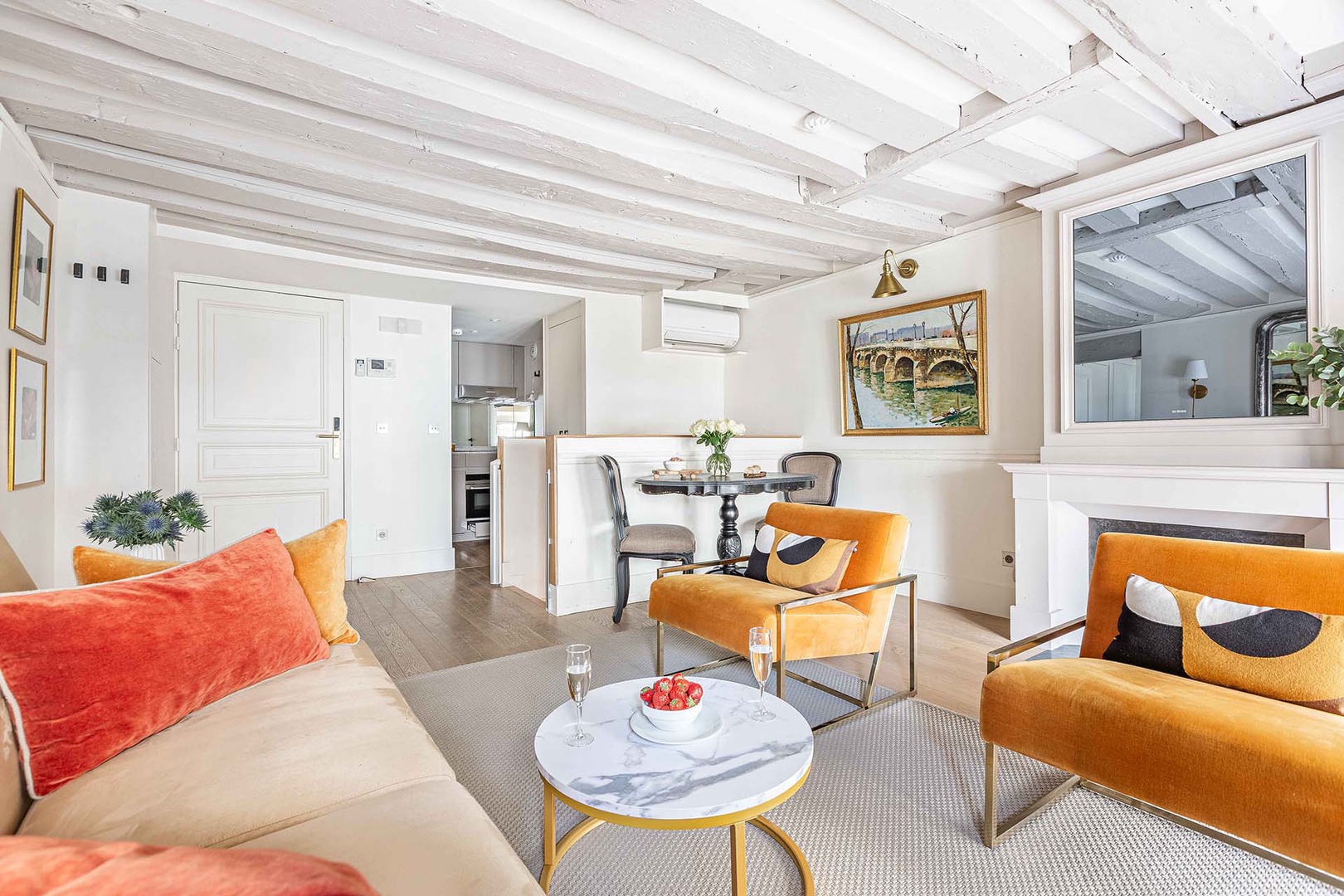 Open-plan living room with kitchen and dining area.