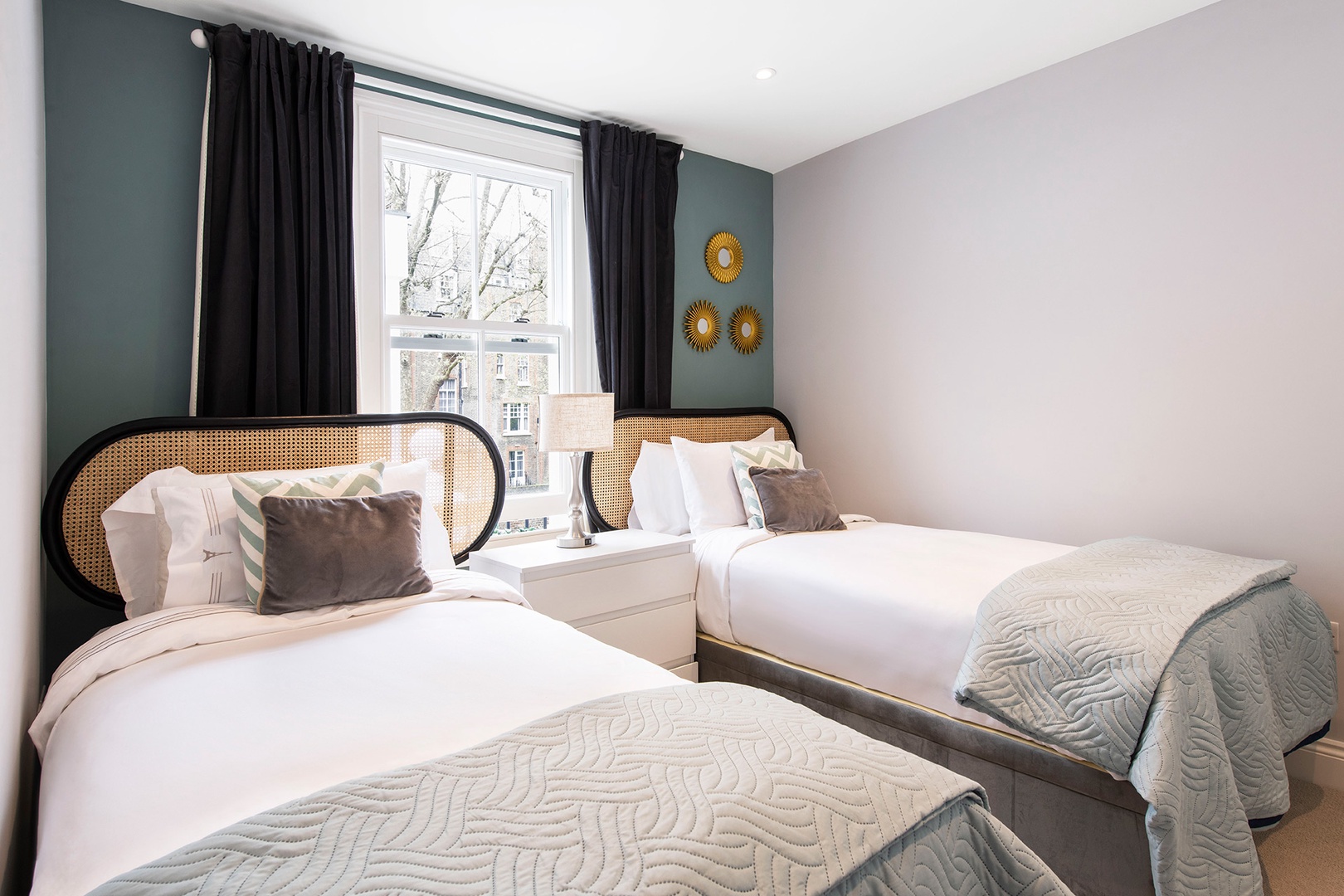 Bedroom 3 with two separate beds that can be combined to form one bed.