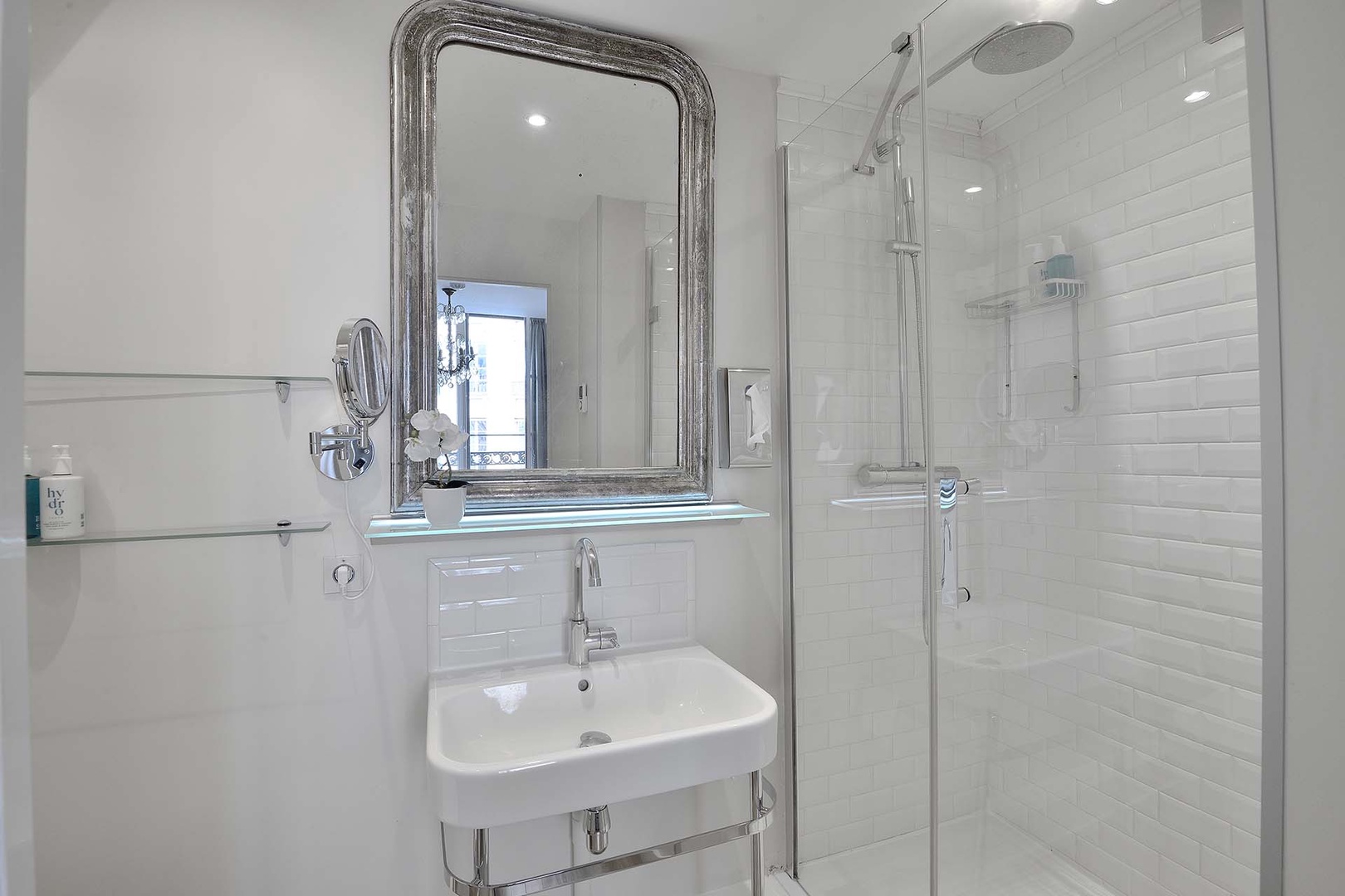 The private bathroom is equipped with a shower, toilet and sink.