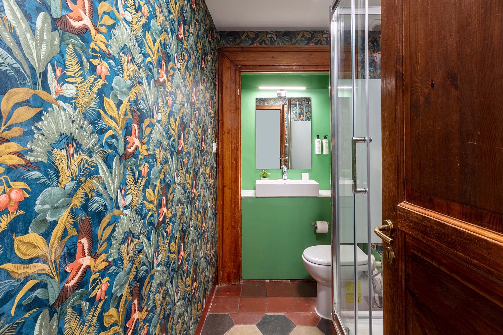 Colorful en suite bathroom in bedroom 3.