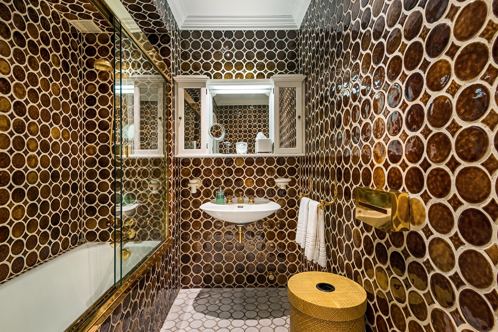 The designer bathroom 2 features one-of-a-kind tiling.