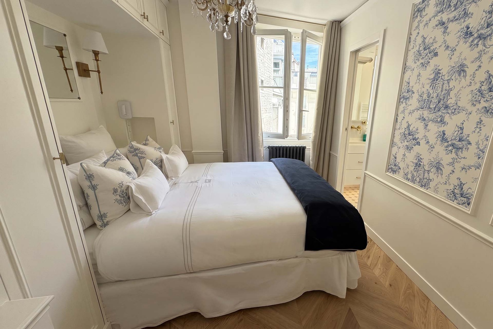Beautifully decorated bedroom 1 with a large bed.