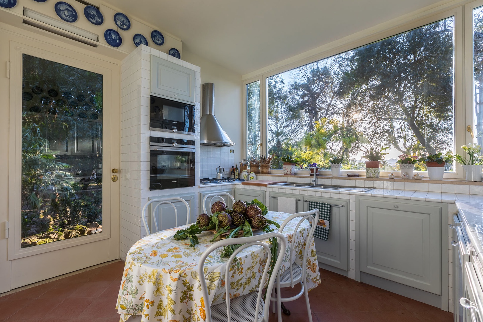 Kitchen table can seat four.