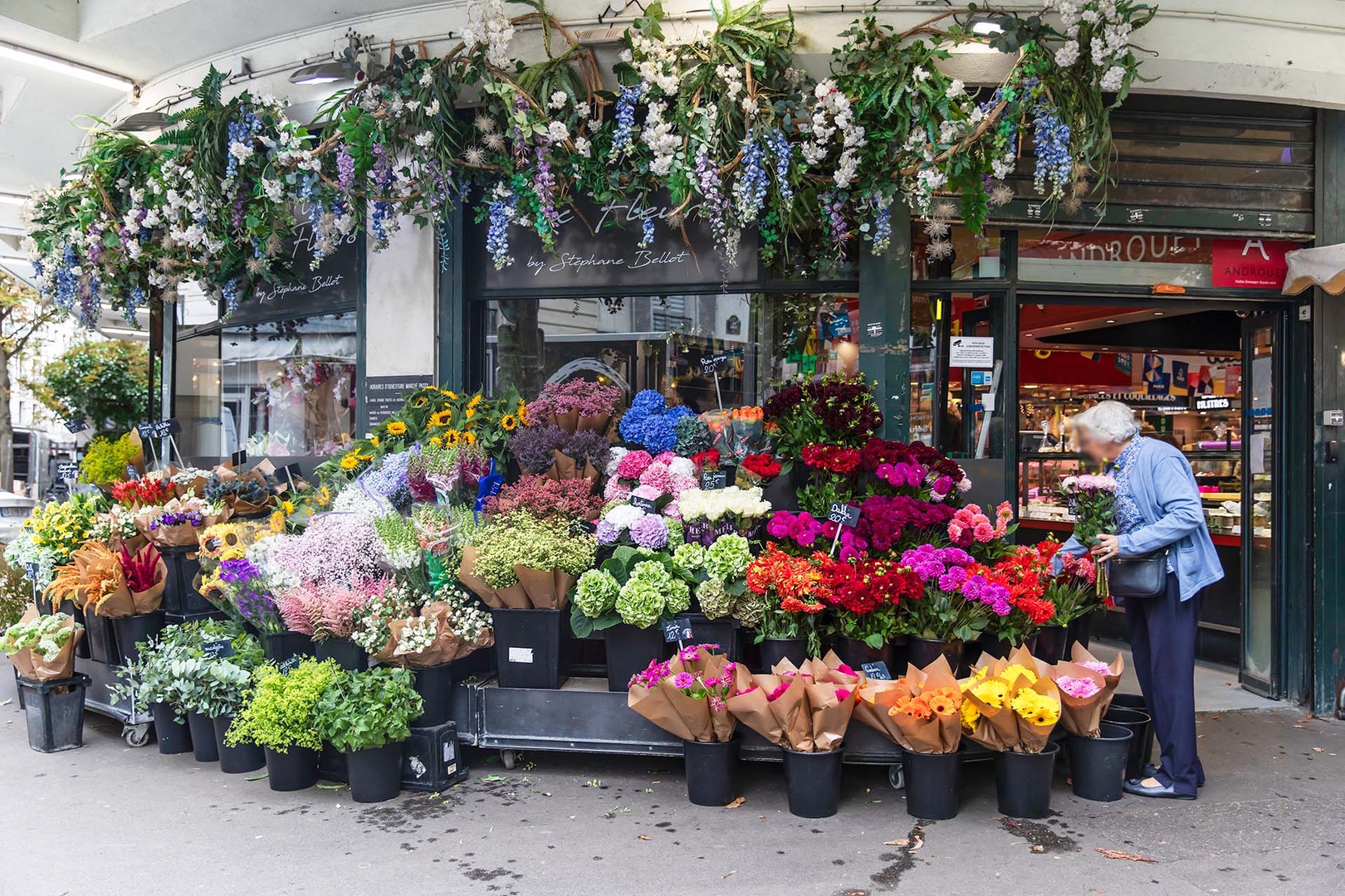 Experience the indoor food market of Marche du Passy, a foodies dream.