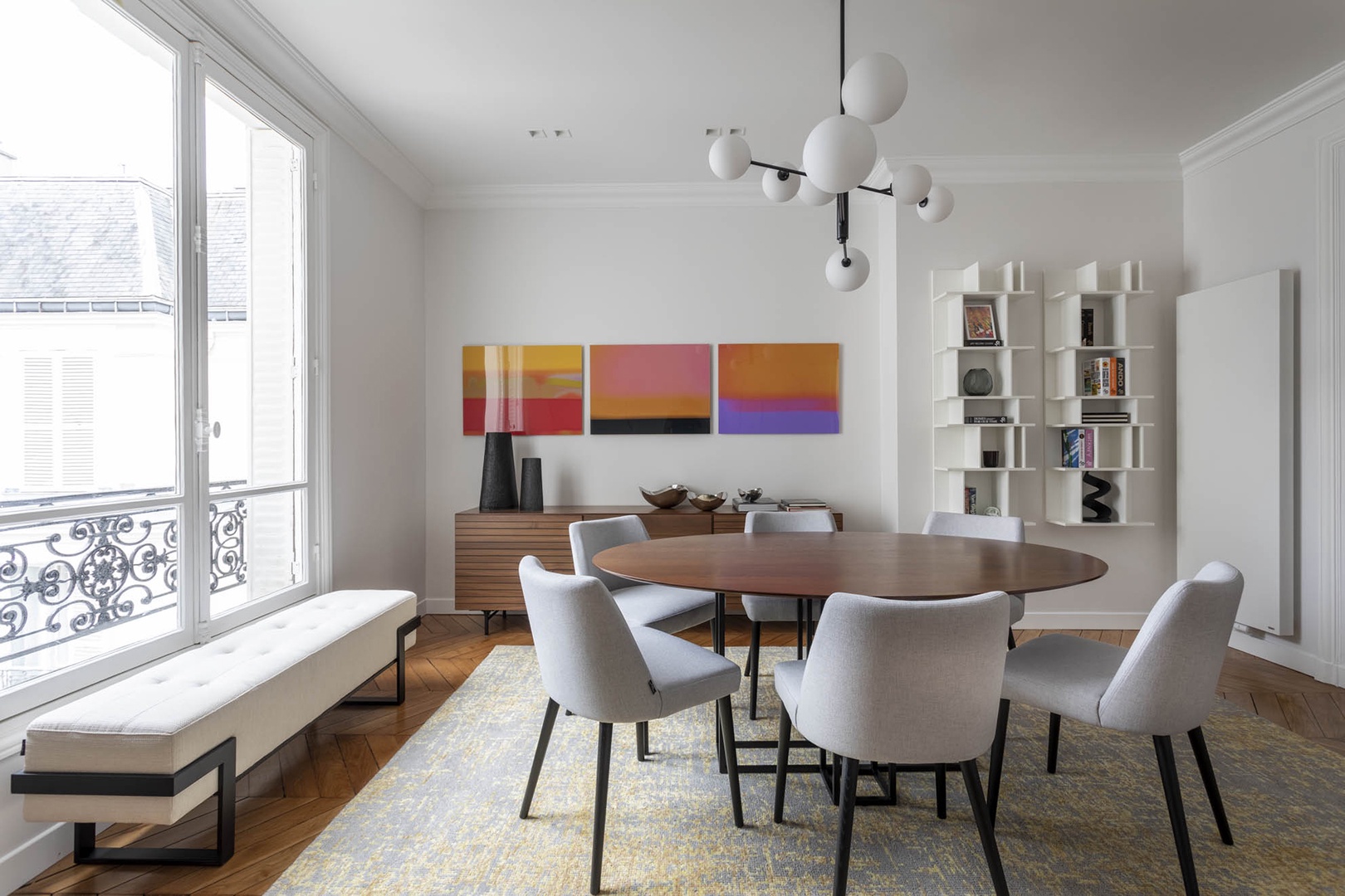 Bright and spacious dining room with large windows.