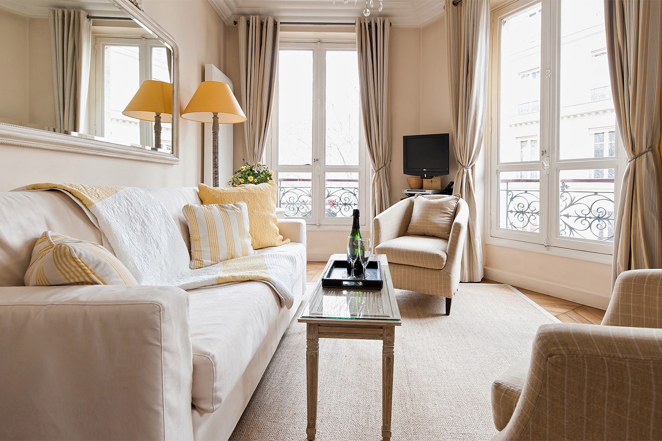 The spacious and elegant apartment is decorated in a charming, elegant French style.