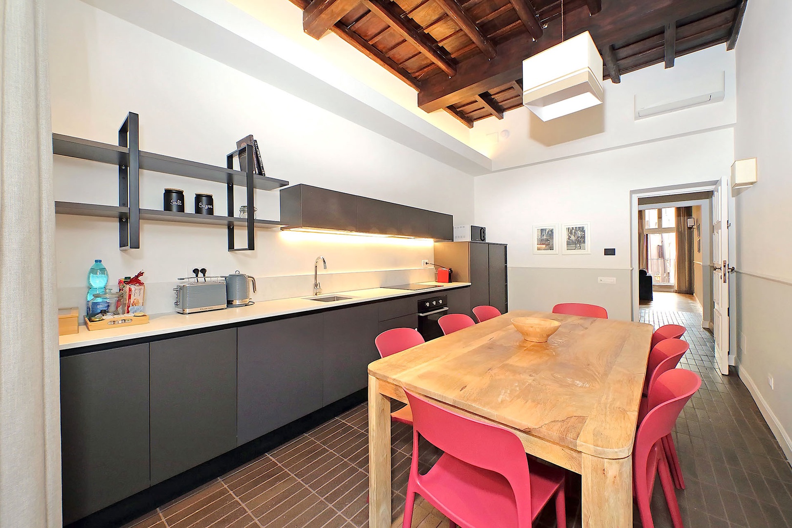 Fully equipped kitchen across from the living room.