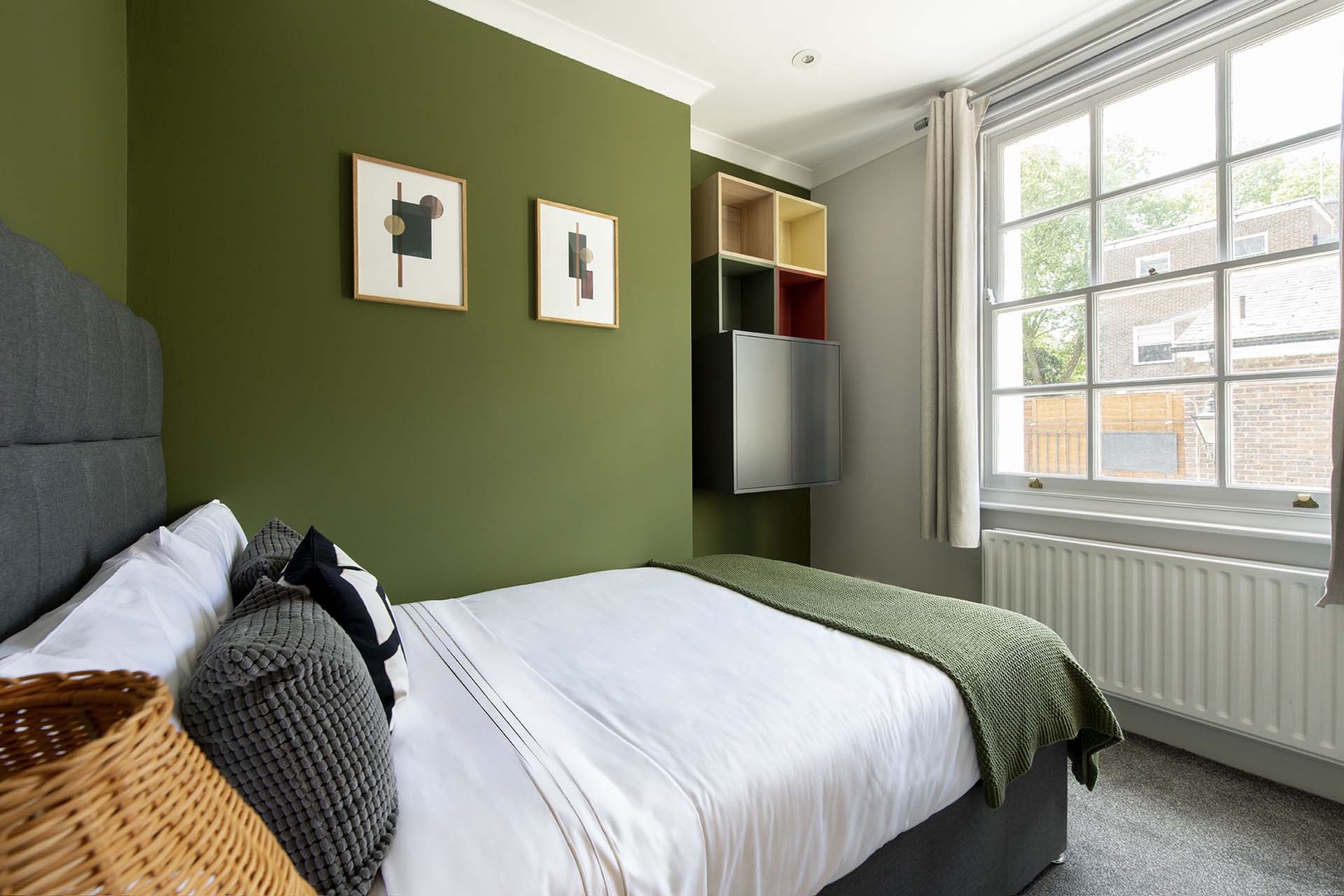 Large window fills the room with light.