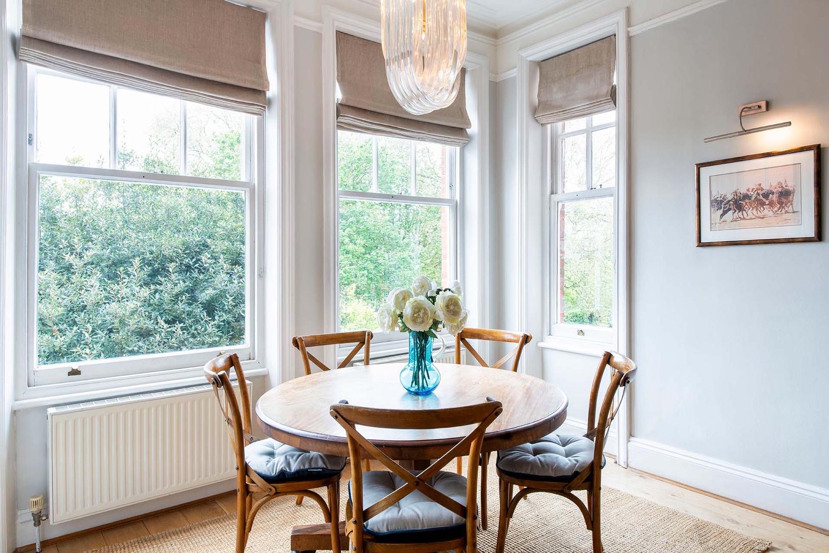 The bright dinning area is a perfect place to gather for meals.