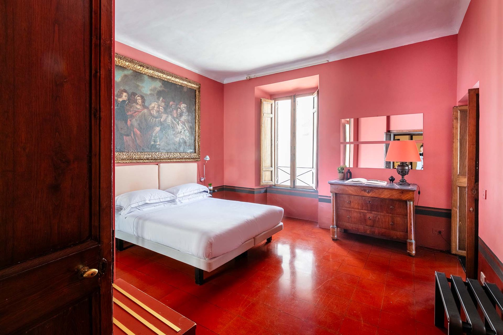 Handsome Pompeii inspired red walls in bedroom 2.