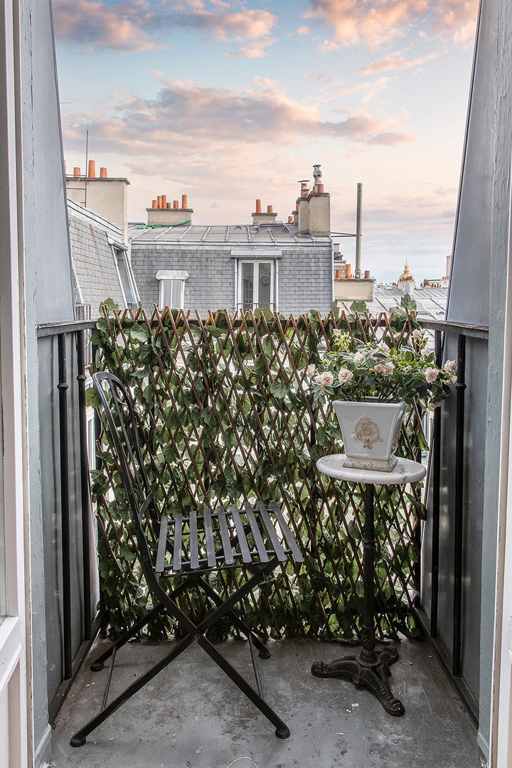 Enjoy views of the romantic Parisian rooftops from the balcony.