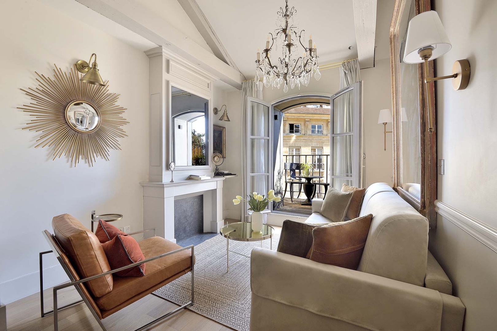 The large French window lets in lots of natural light at the beautiful Monbazillac apartment.