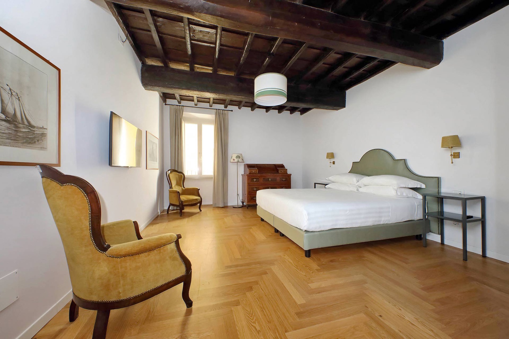 Bedroom 1 with rustic wood beamed ceilings