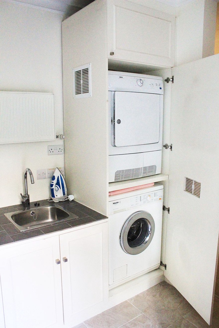 Laundry room with separate washer and dryer