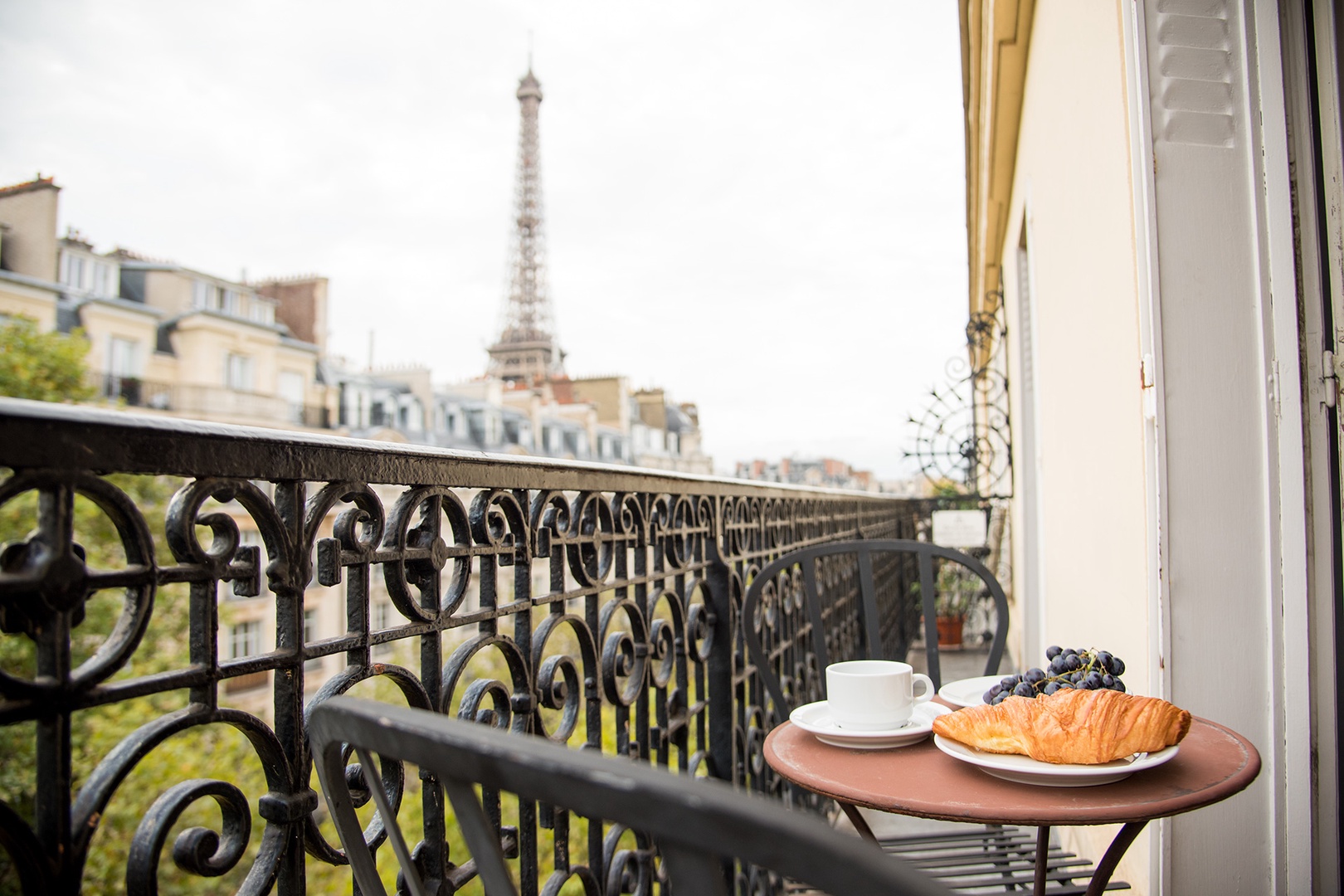 The stunning balcony offers remarkable views of the Eiffel Tower!