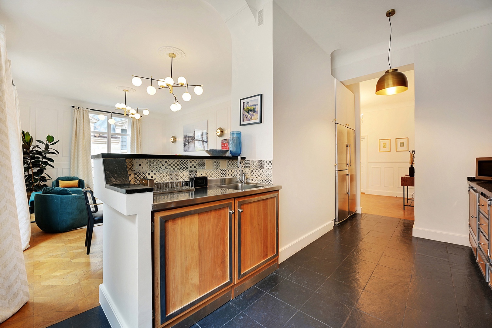 Kitchen opens to the dining area and living room.