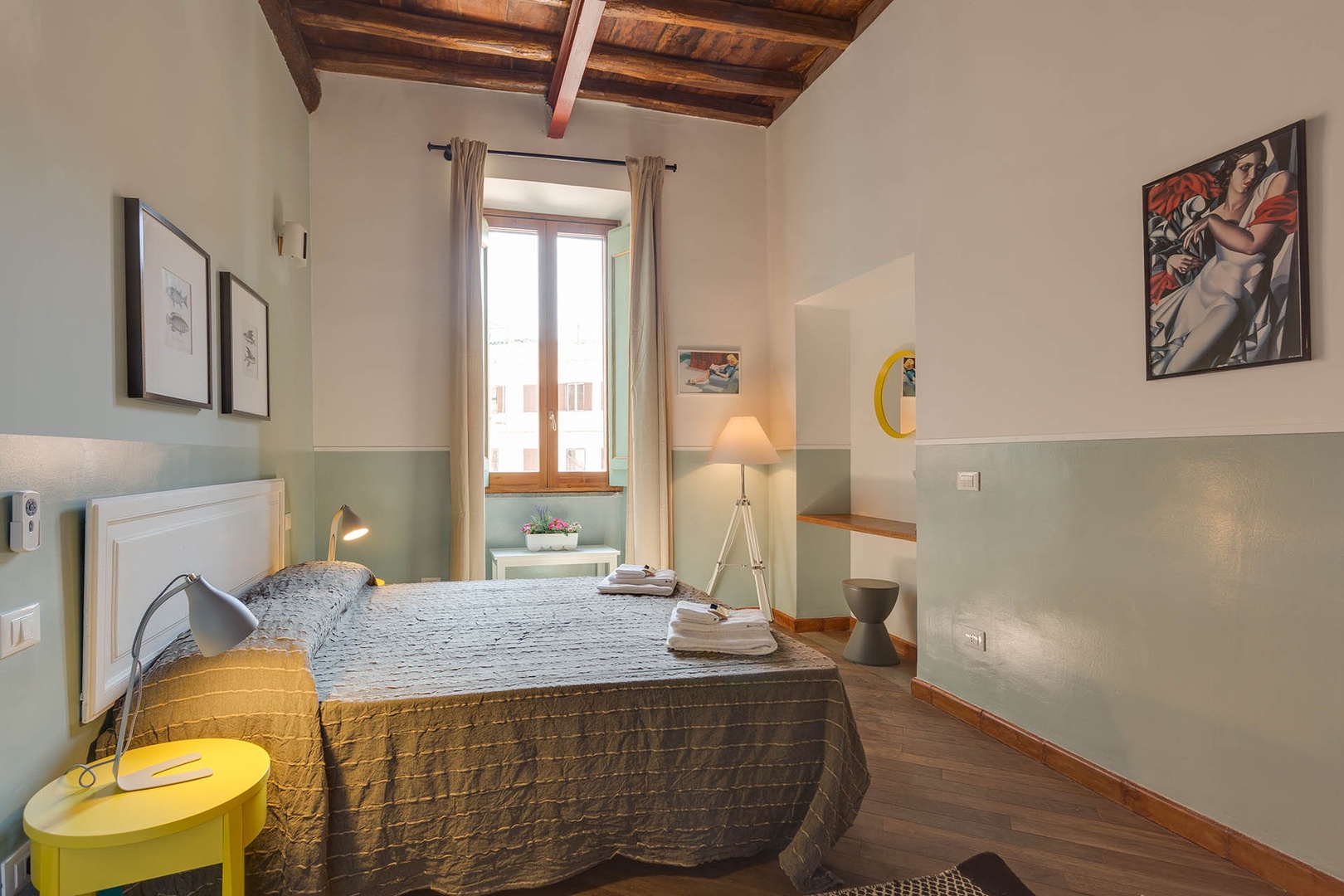 Bedroom 2 with rustic ceiling and large window