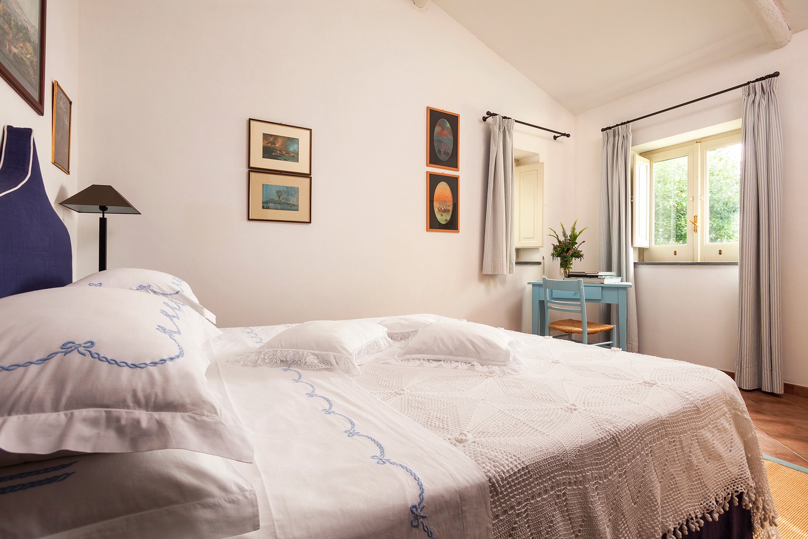 Cottage bedroom with en suite bathroom.