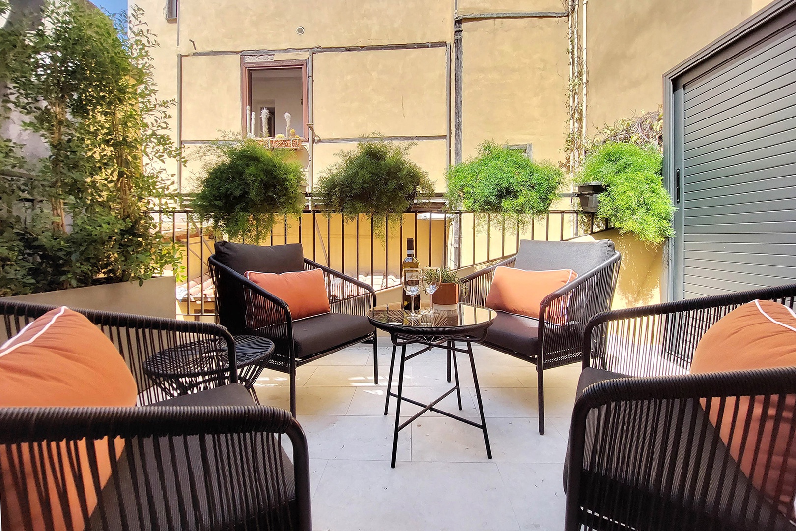The terrace is a perfect spot to gather for a glass of wine.