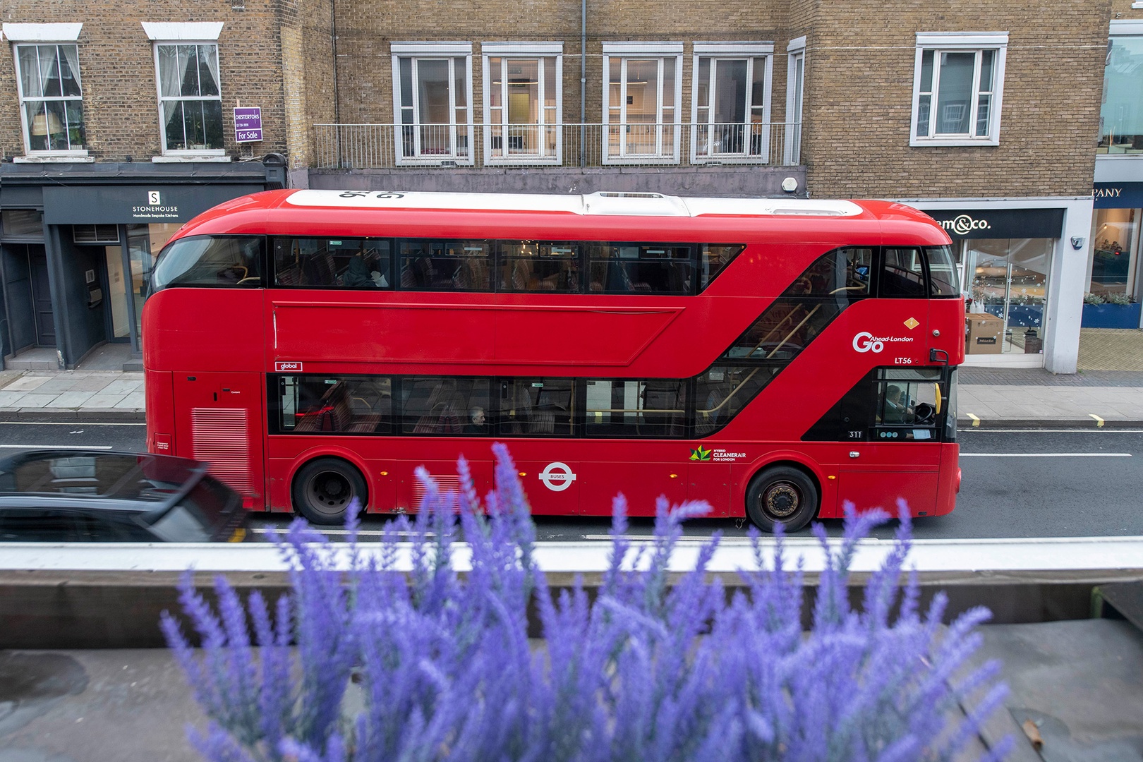 Catch a sight of classic red London buses from the living room!