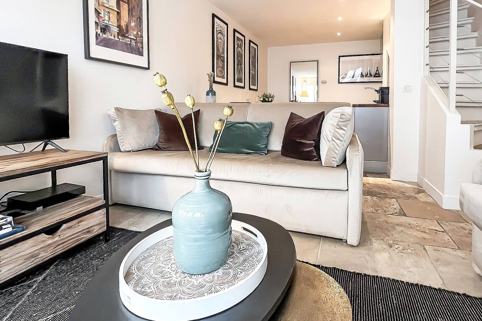 Ground level living room opens to dining area and kitchen.