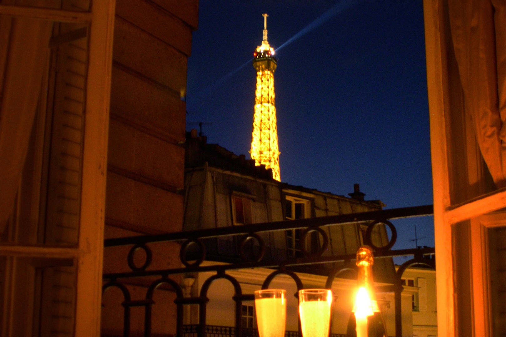 Watch the lights sparkle on the Eiffel Tower right from the apartment.