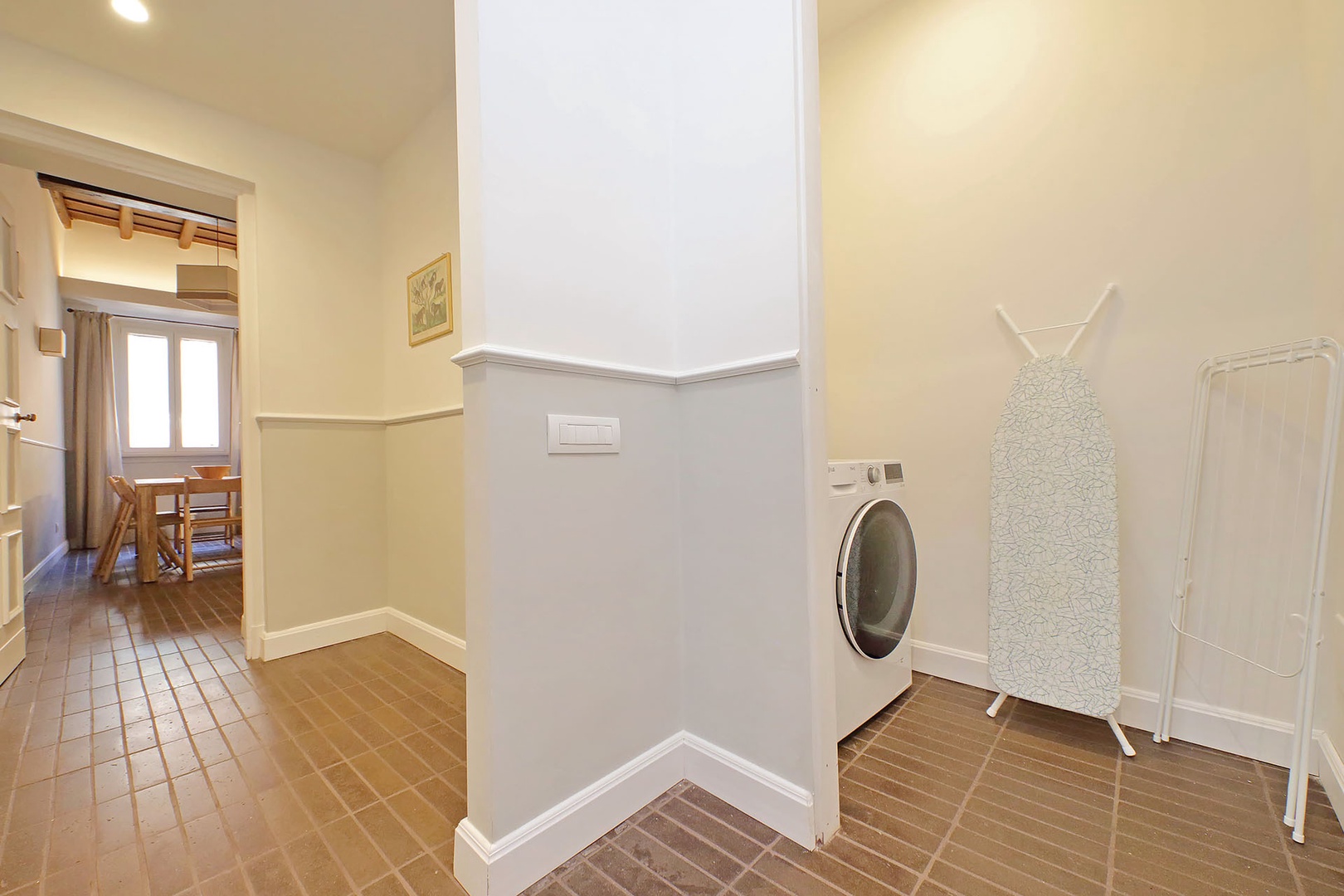 Spacious laundry area with a combination washer/dryer