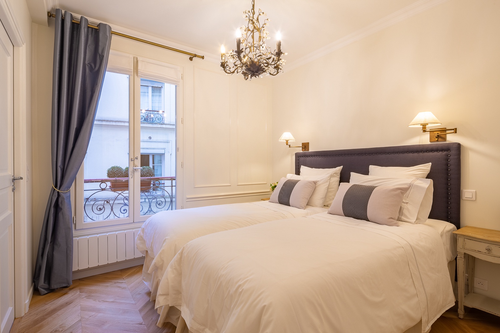 Bedroom 1 overlooks the quiet courtyard.