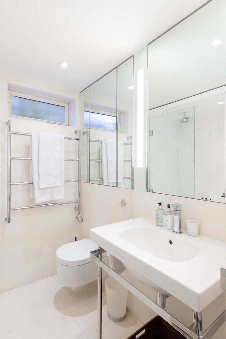 Bathroom 3 is en suite to bedroom 3 with combination bathtub/shower.